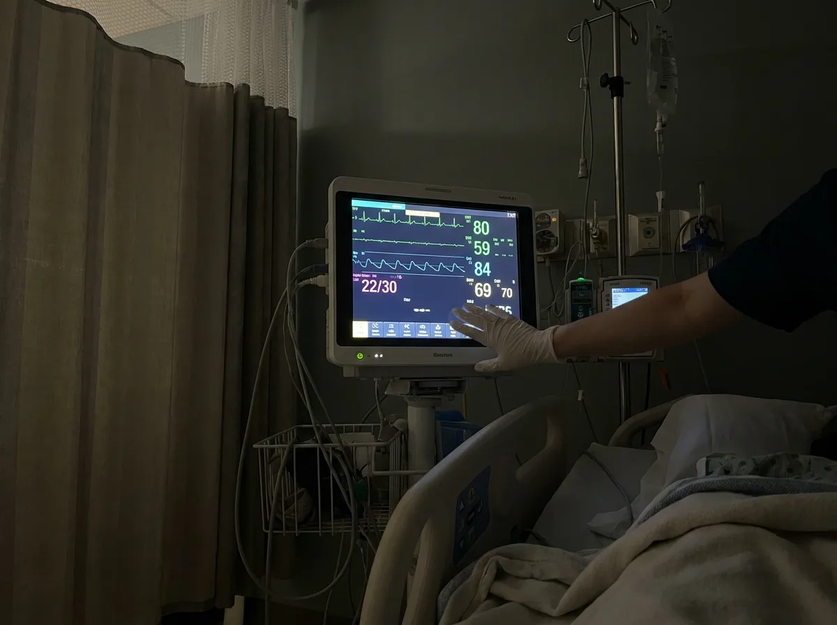 Bedside monitor displaying vital signs in an intensive care unit