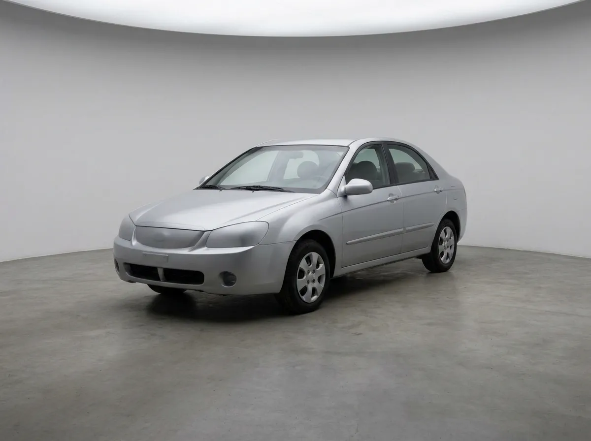 Generic sedan in neutral studio setting with even lighting